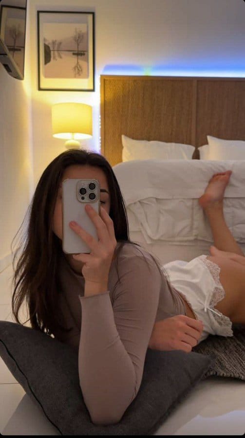 A foot model during a live cam session on one of the best foot cams, creating a genuine connection with her audience.