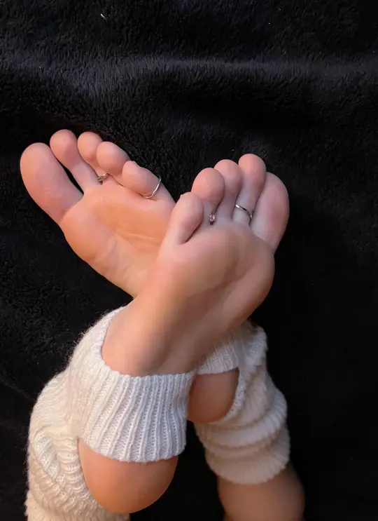 Foot cam model showing her soles.